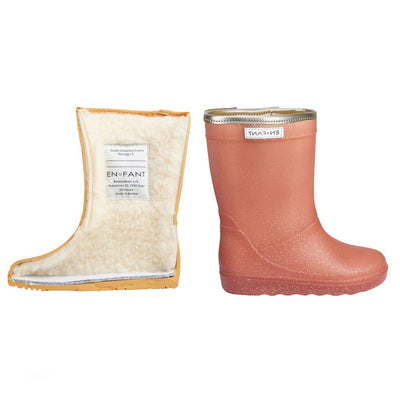 De gevoerde thermoboots van EN FANT koop je bij Charly's! De regenlaarzen zijn met 90% wol gevoerd. SnDe thermoboots zijn gevoerd met wol aan de binnenzijde. De regenlaarzen zijn van ENFANT en rose glitter van kleur.elle levering en lage verzendkosten!